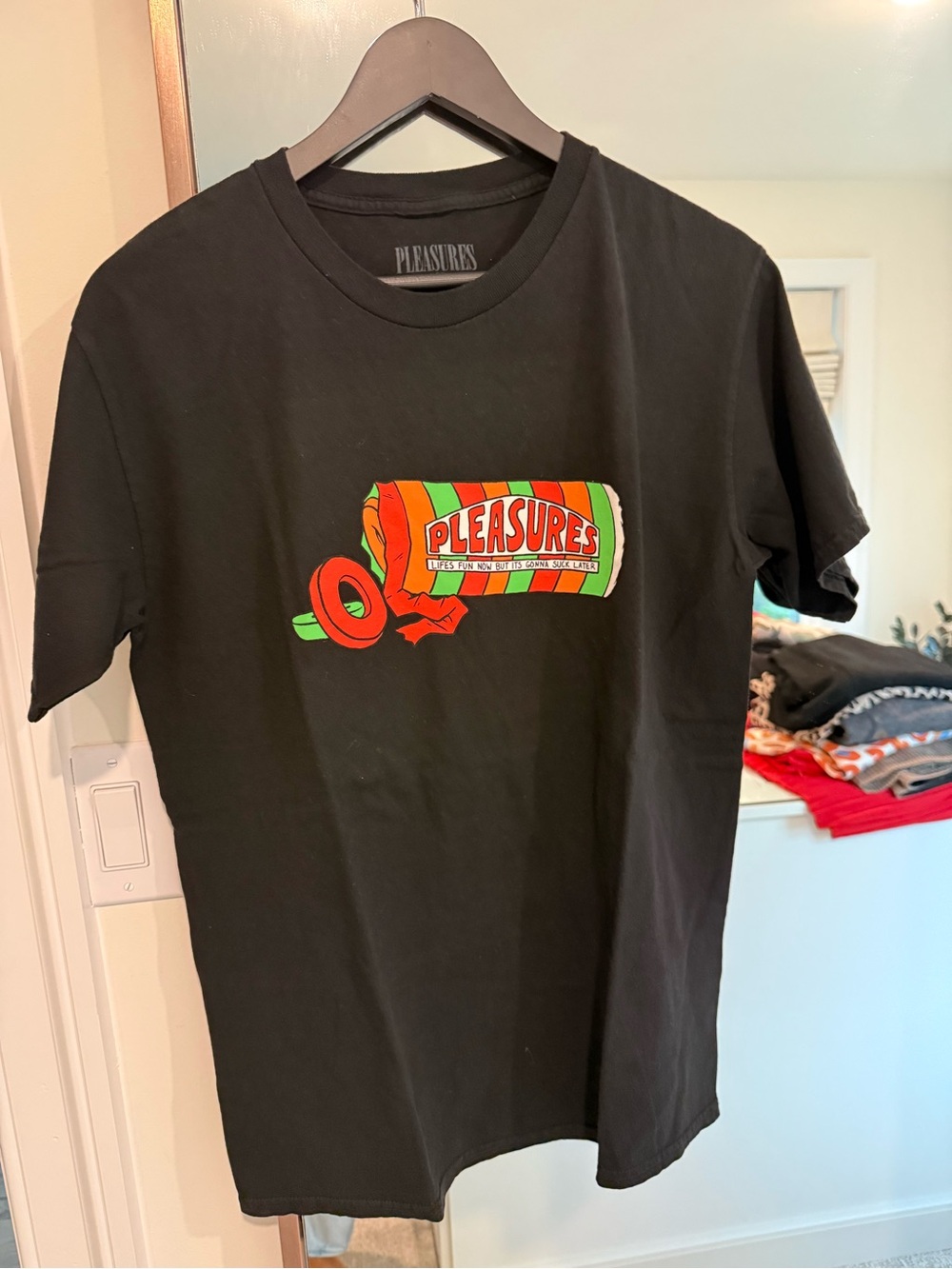 Pleasures Black Short Sleeve Graphic Tee - Black with Red & Green Logo